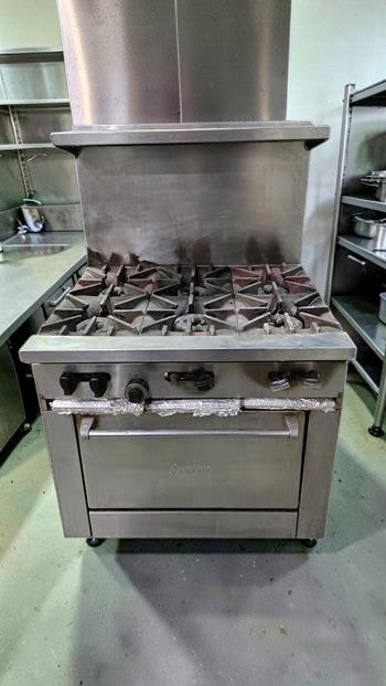 Well-Maintained Condition – SunFire X36-6B – Commercial 36" Gas Range – 6 Open Burners – Standard Oven – Stainless Steel – 2 Oven Racks – Casters – Fully Tested & Operational!