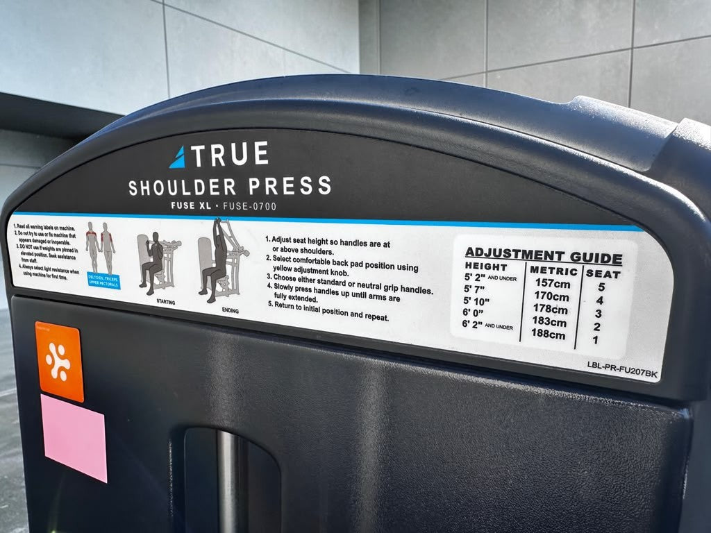 Remarkable Condition – TRUE Fitness FUSE-0700 – Commercial Selectorized Shoulder Press – Independent Converging Arms – Adjustable Seat & Back Pad – Fully Inspected & Operational!