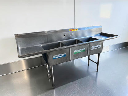 Flawless Condition – Commercial Three-Compartment Stainless Steel Sink – Dual Drainboards – High Backsplash – Adjustable Legs – Fully Inspected & Ready for Installation!