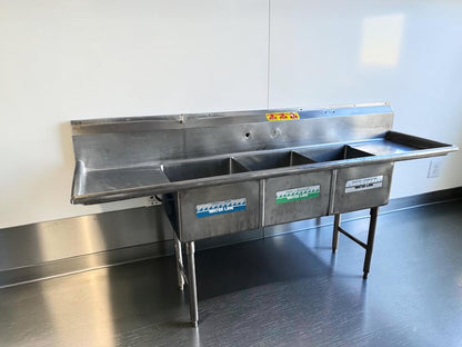 Flawless Condition – Commercial Three-Compartment Stainless Steel Sink – Dual Drainboards – High Backsplash – Adjustable Legs – Fully Inspected & Ready for Installation!