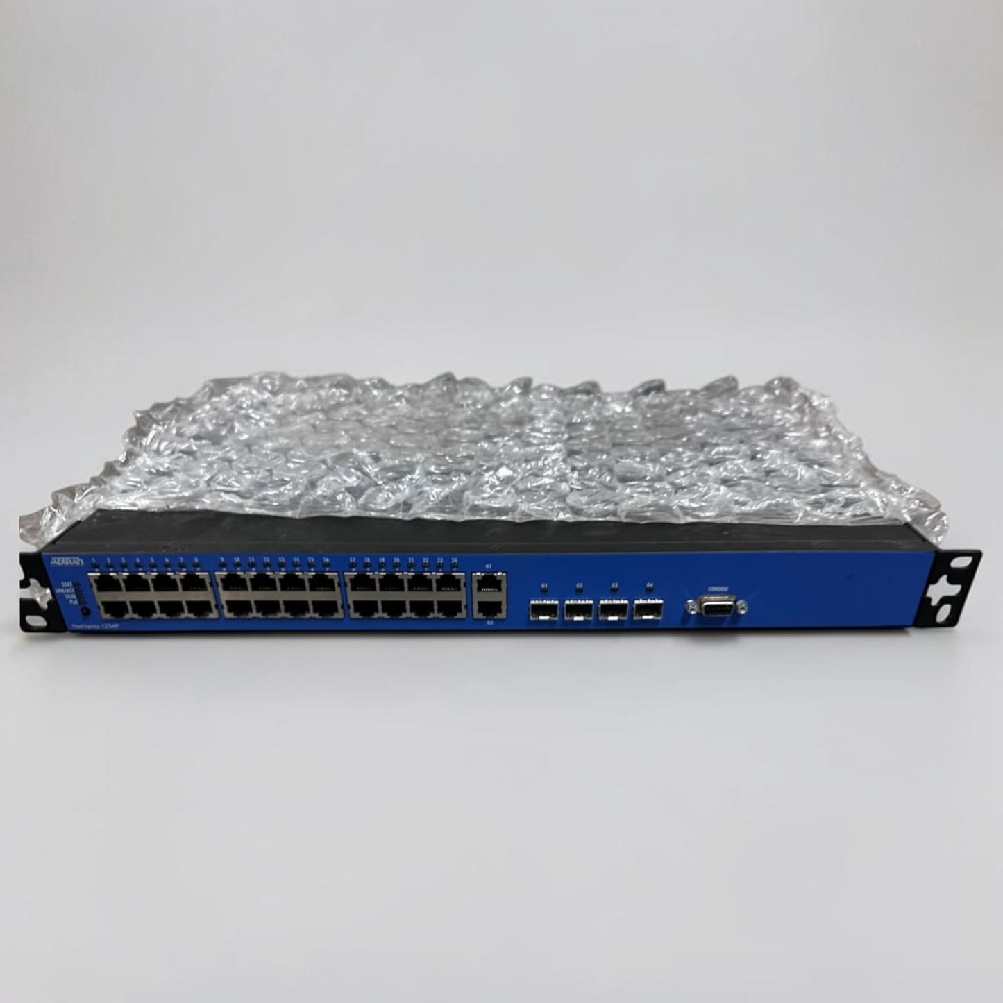 Dependable Condition – ADTRAN NetVanta 1234P 3rd Gen – 24-Port Fast Ethernet PoE Managed Switch – Quad Gigabit Uplinks – Fully Tested & Operational!